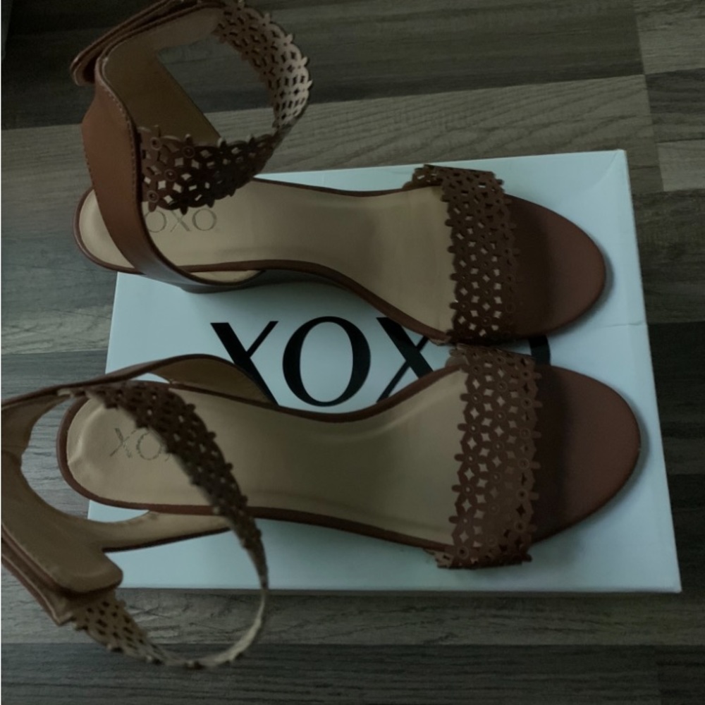 Light brown ankle strap wedge heel shoe they are new.